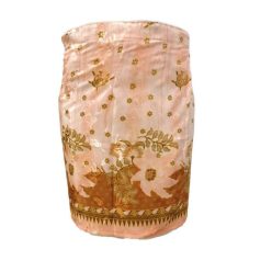 Lapszoknya rövid, virágos barackszínű alul díszsáv