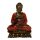 Meditáló Buddha szobor lótuszon – arany-narancs, a belső béke szimbóluma